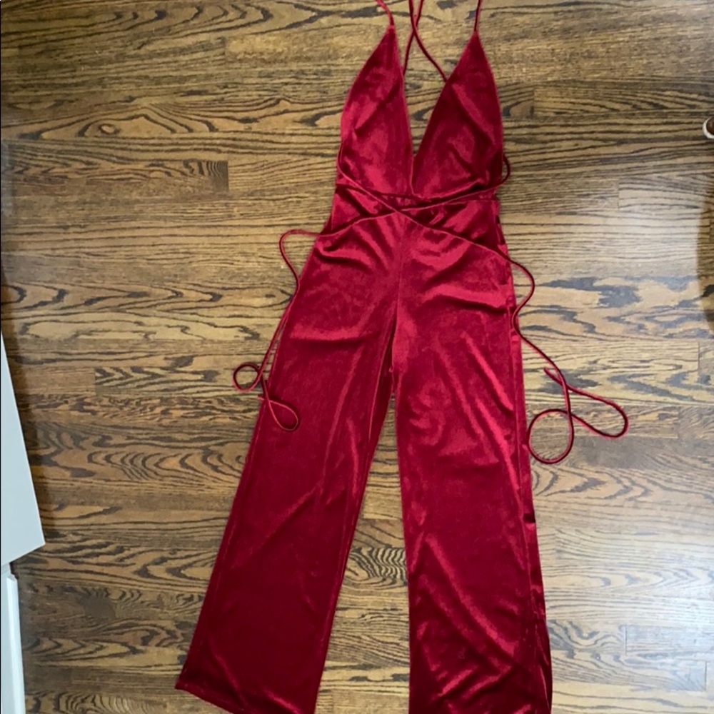 Red velvet jumpsuit. Worn once